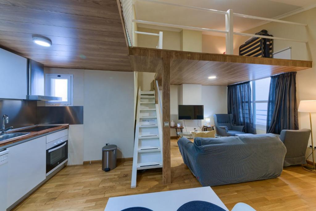 Kuchyňa alebo kuchynka v ubytovaní Holidays2Malaga Soho Penthouse