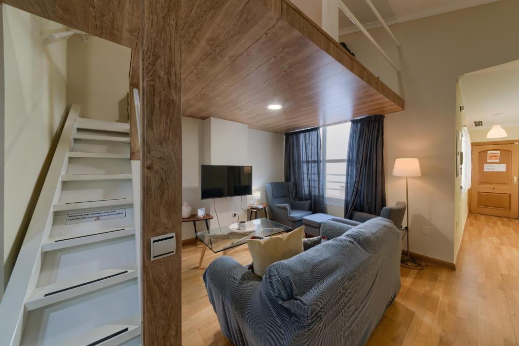 Televízia a/alebo spoločenská miestnosť v ubytovaní Holidays2Malaga Soho Penthouse