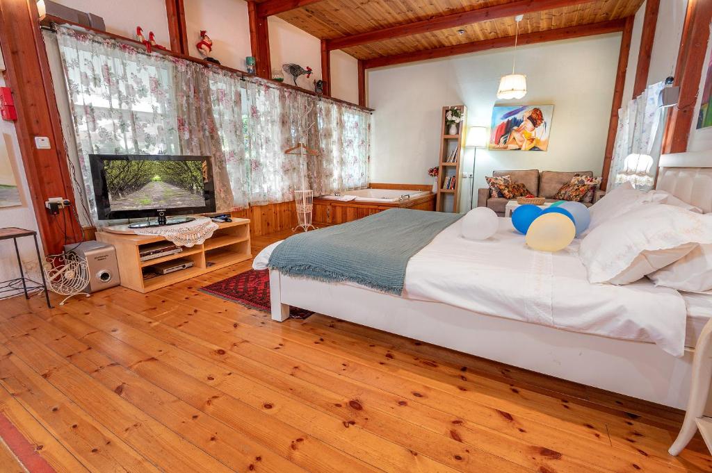 Postel nebo postele na pokoji v ubytování Marom Romance