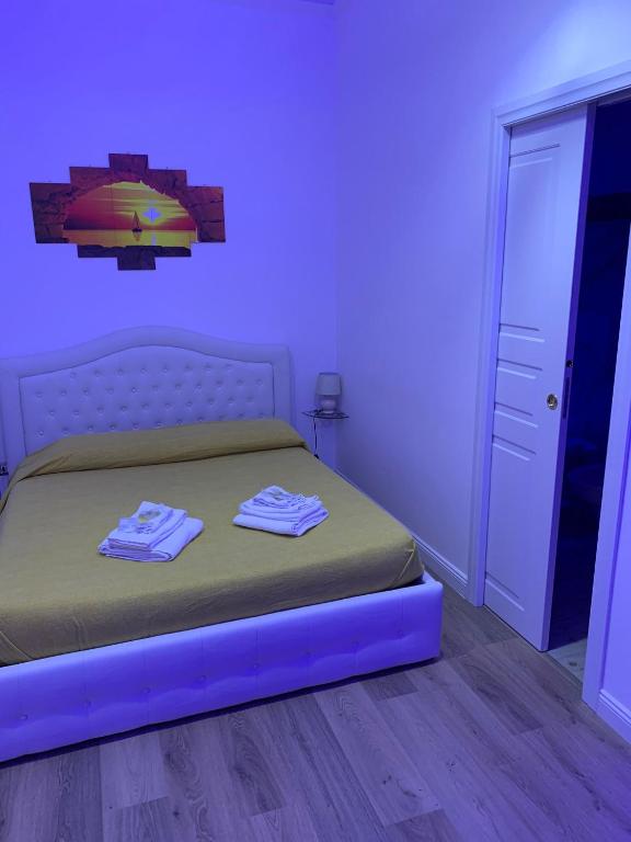 Łóżko lub łóżka w pokoju w obiekcie Messina41 Hotel
