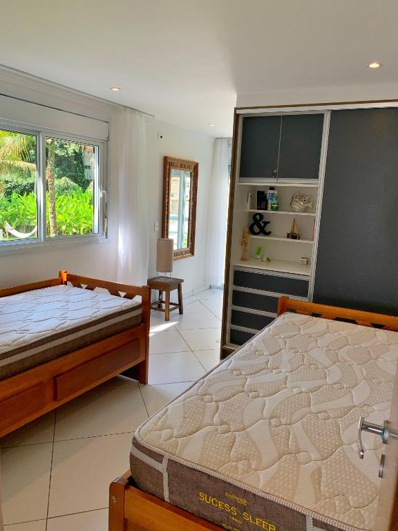  Casa alto padrão Pé na areia