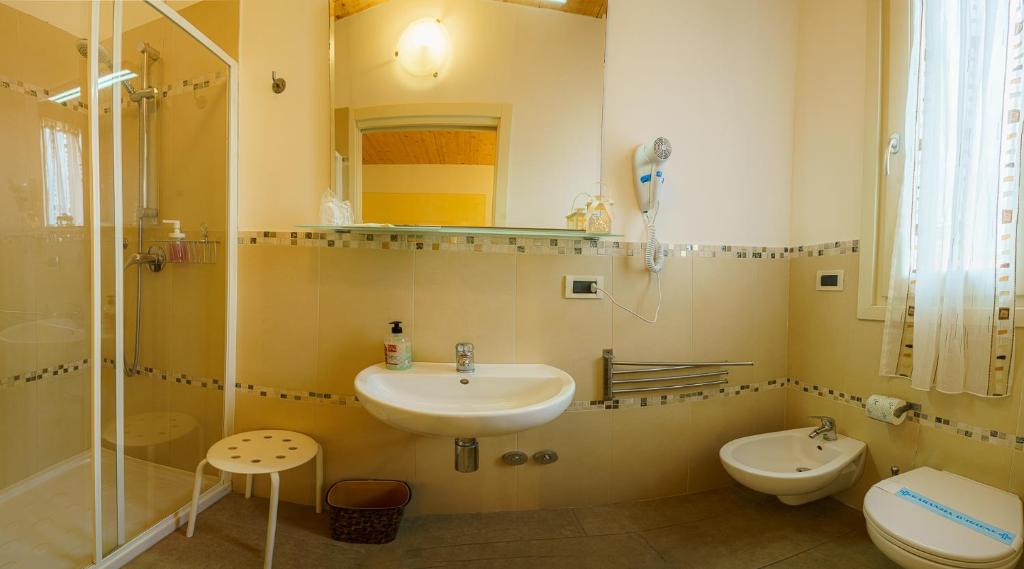 Kúpeľňa v ubytovaní Albergo La Lampara