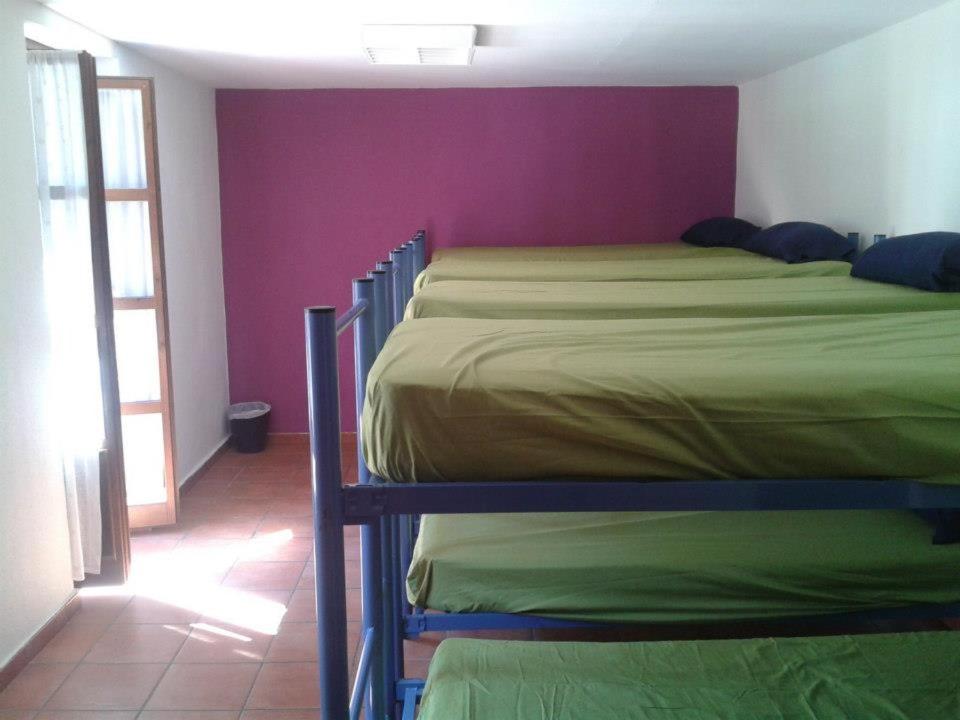 Postel nebo postele na pokoji v ubytování Albergue de Canfranc Estación