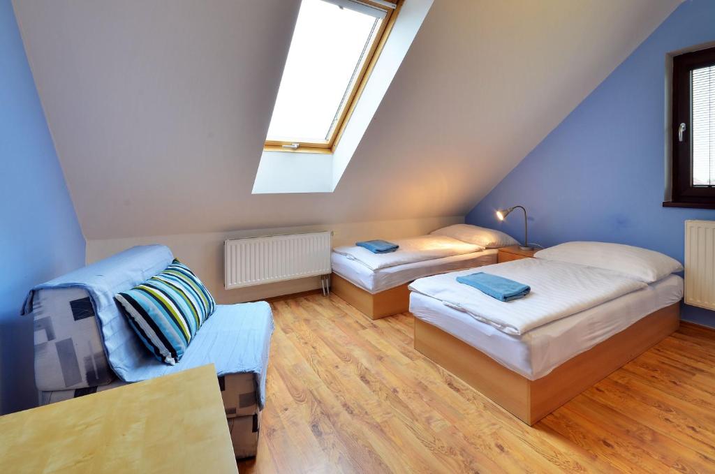 Letto o letti in una camera di Pension Markéta