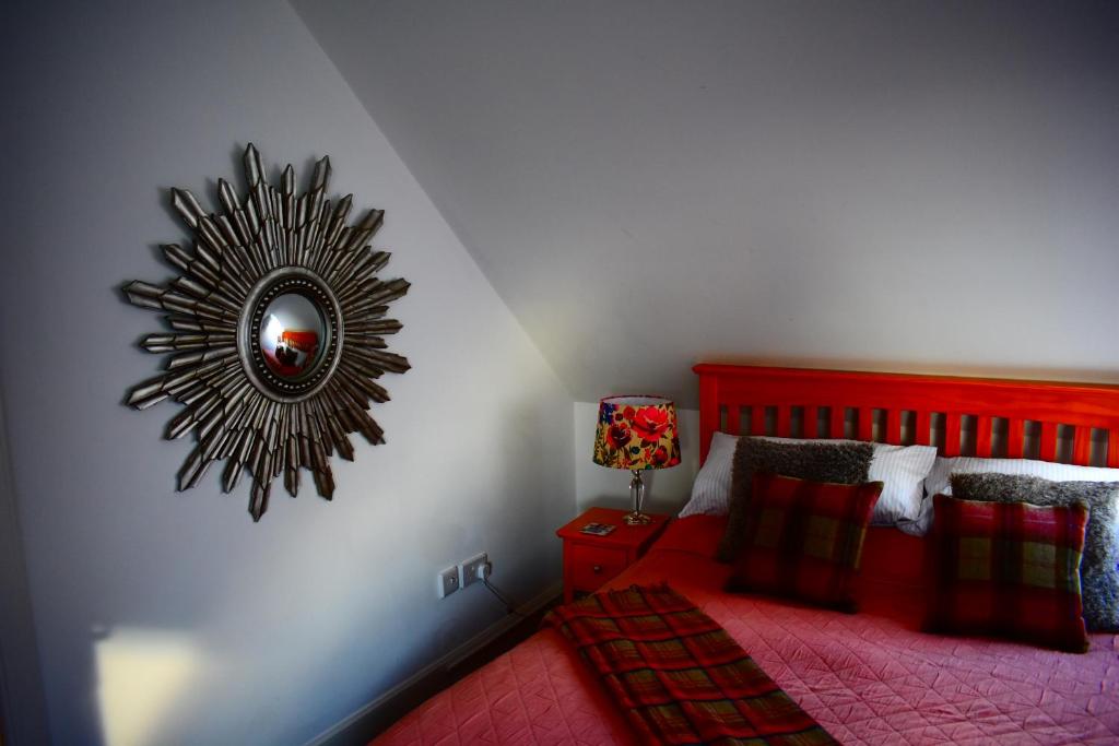 Postel nebo postele na pokoji v ubytování Clouds B&B