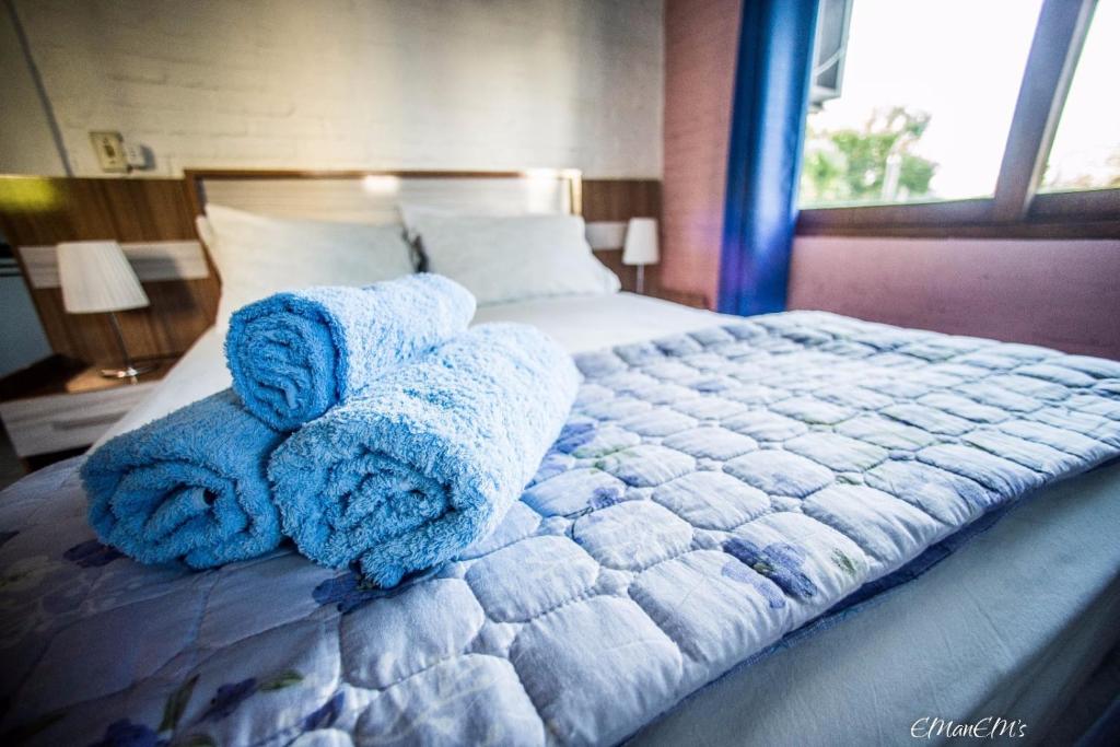 Postel nebo postele na pokoji v ubytování Apartamentos Oyster