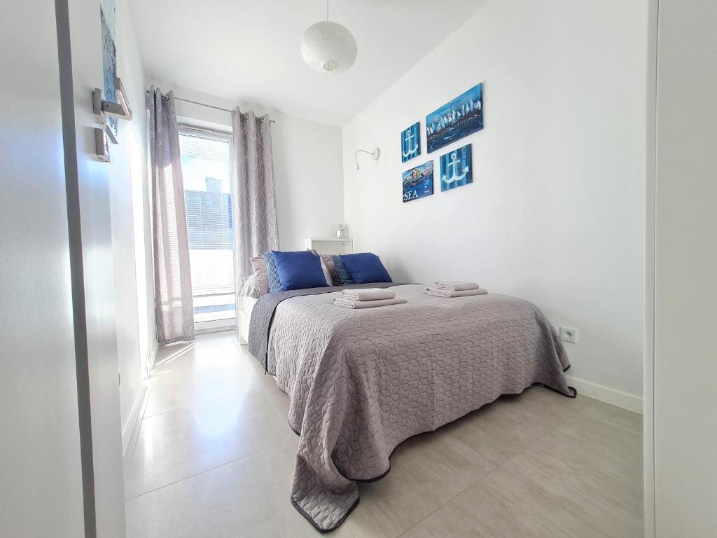 Posteľ alebo postele v izbe v ubytovaní Apartment 1A