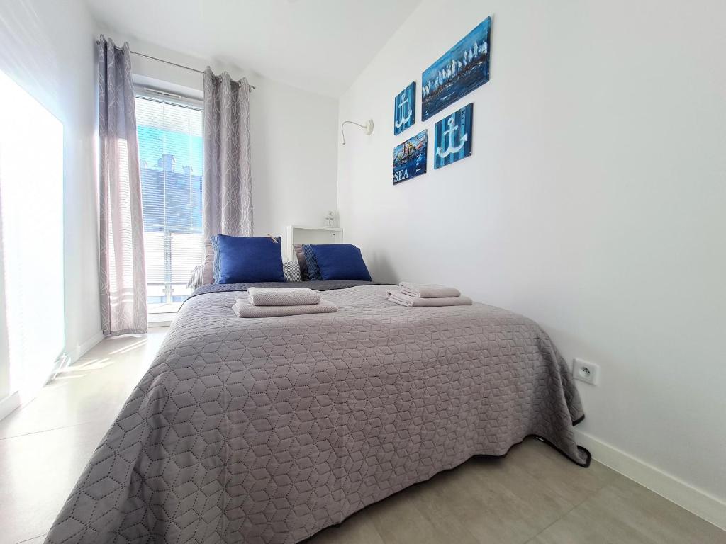Posteľ alebo postele v izbe v ubytovaní Apartment 1A