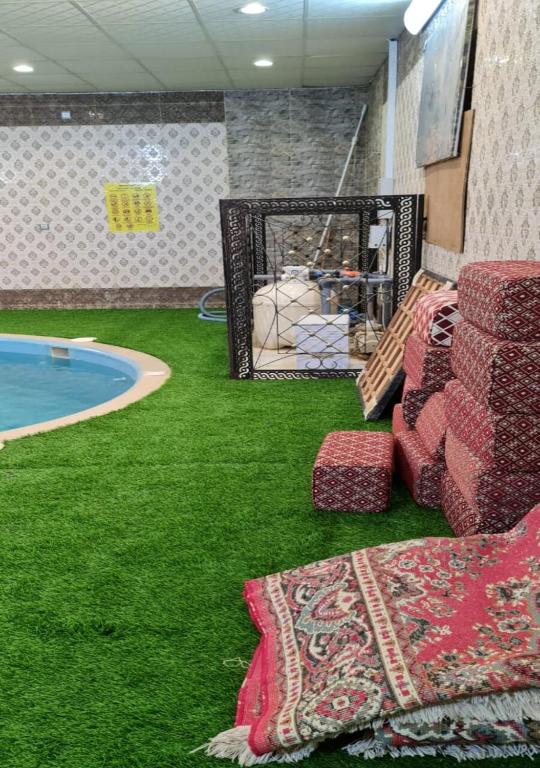 Posezení v ubytování Al Moltaqua Chalet