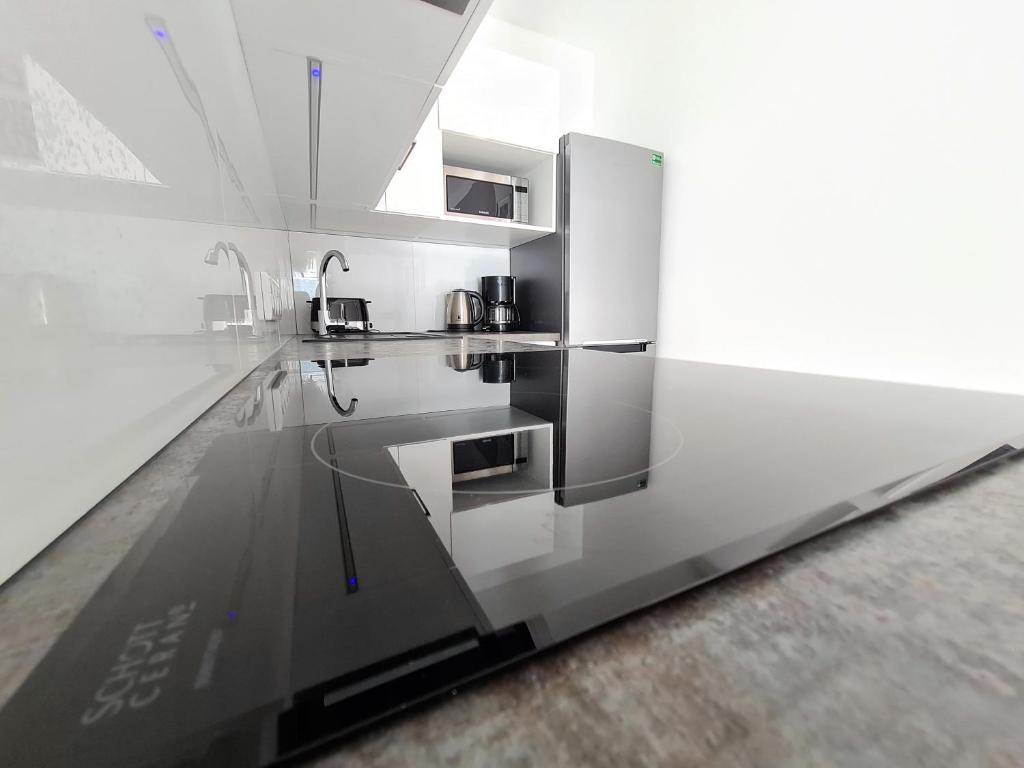 Kuchyňa alebo kuchynka v ubytovaní Apartment 1A