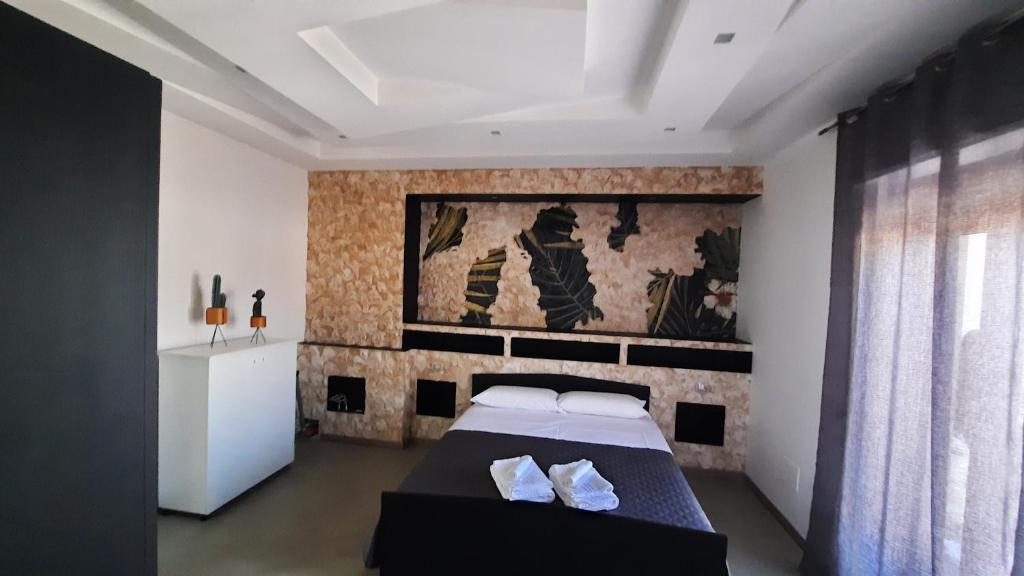 A bed or beds in a room at WiSaRelax