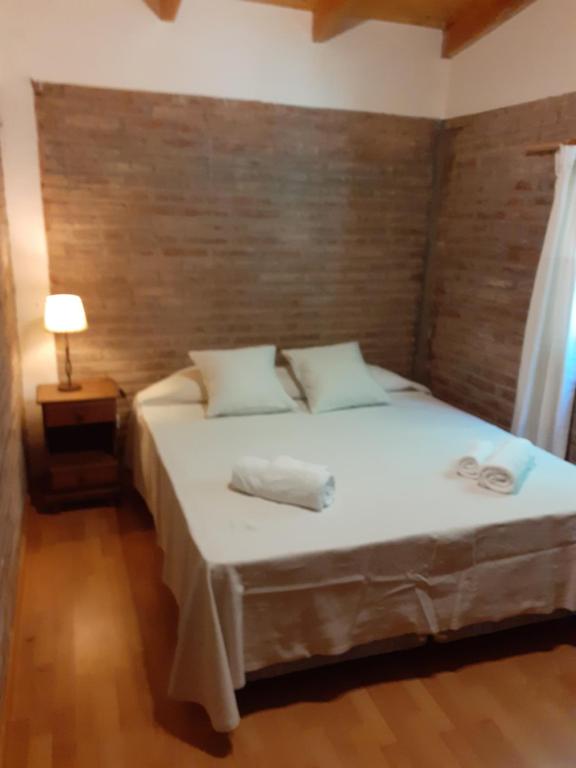 Кровать или кровати в номере Morada Tronador