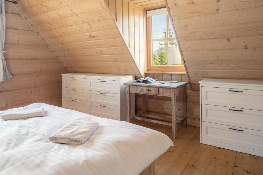 Postel nebo postele na pokoji v ubytování Nydala Rustic