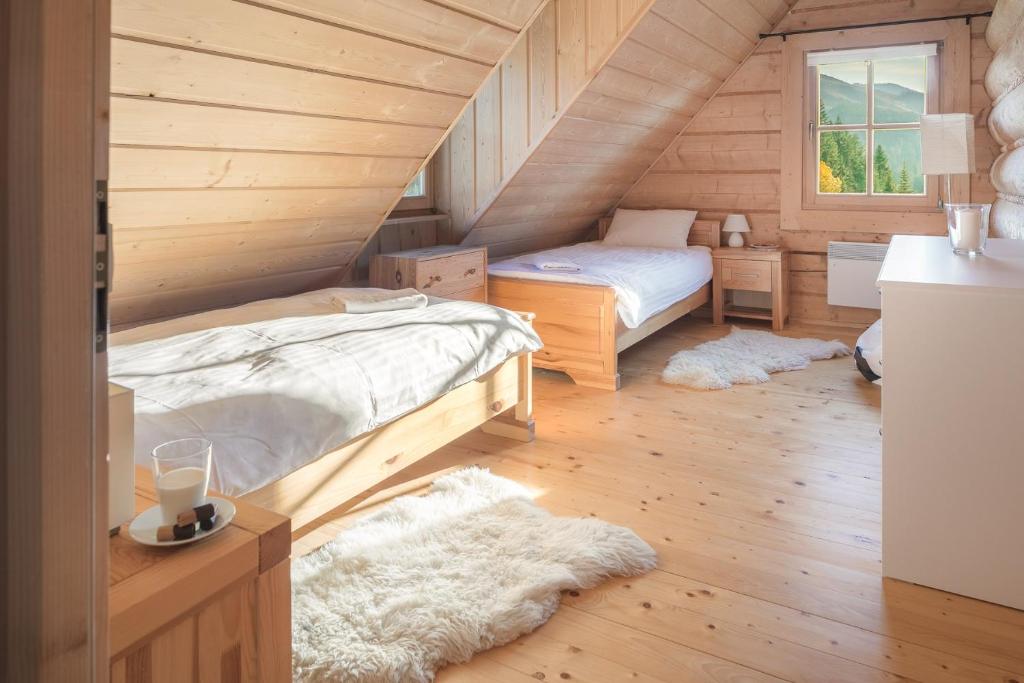 Postel nebo postele na pokoji v ubytování Nydala Rustic