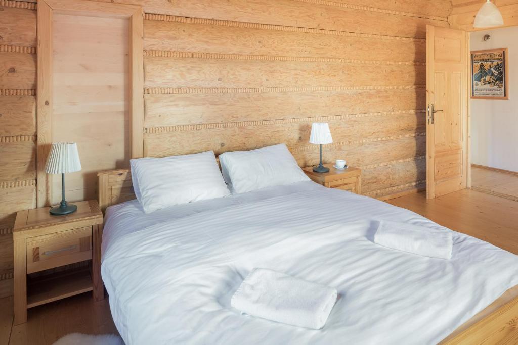 Postel nebo postele na pokoji v ubytování Nydala Rustic