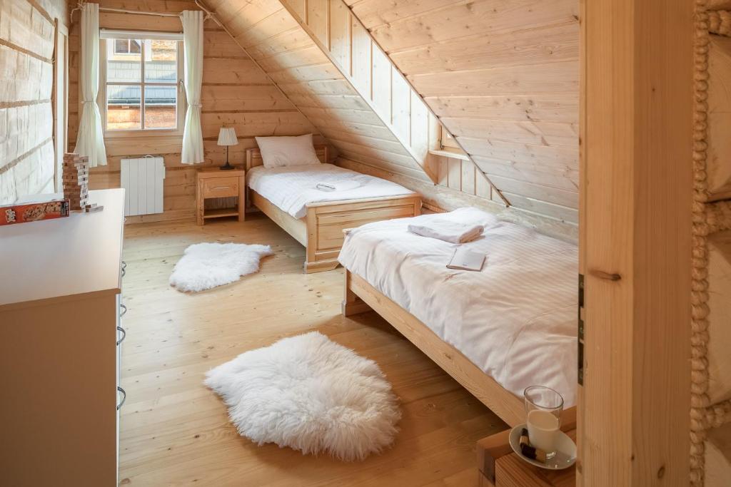 Postel nebo postele na pokoji v ubytování Nydala Rustic
