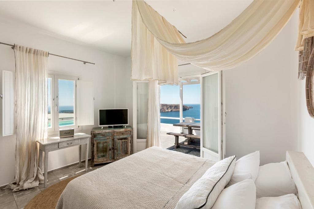 TV a/nebo společenská místnost v ubytování Grand View - Megalochori Santorini