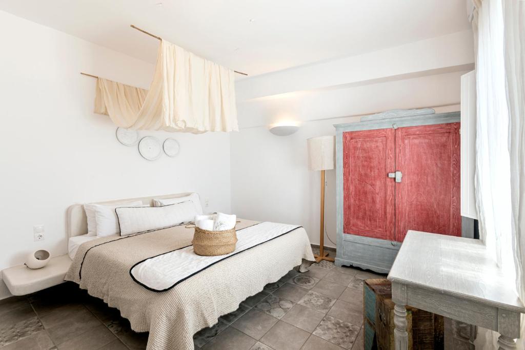 Postel nebo postele na pokoji v ubytování Grand View - Megalochori Santorini