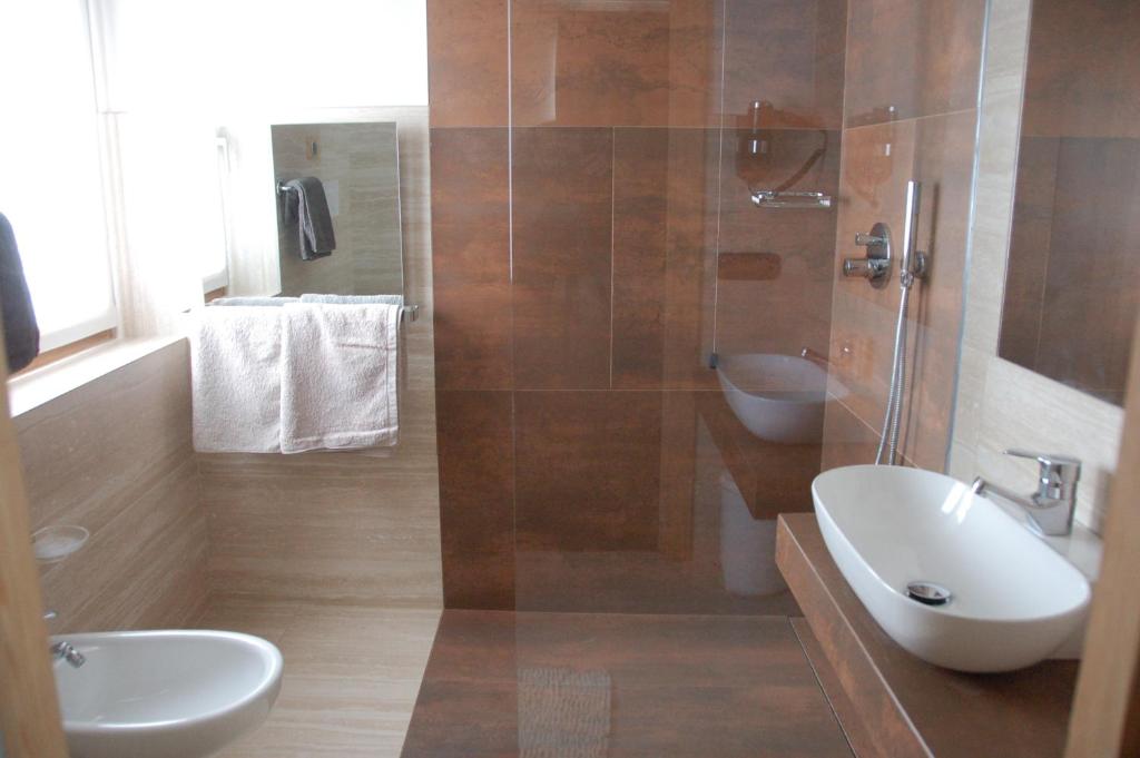 Koupelna v ubytování Hotel Carpe Diem