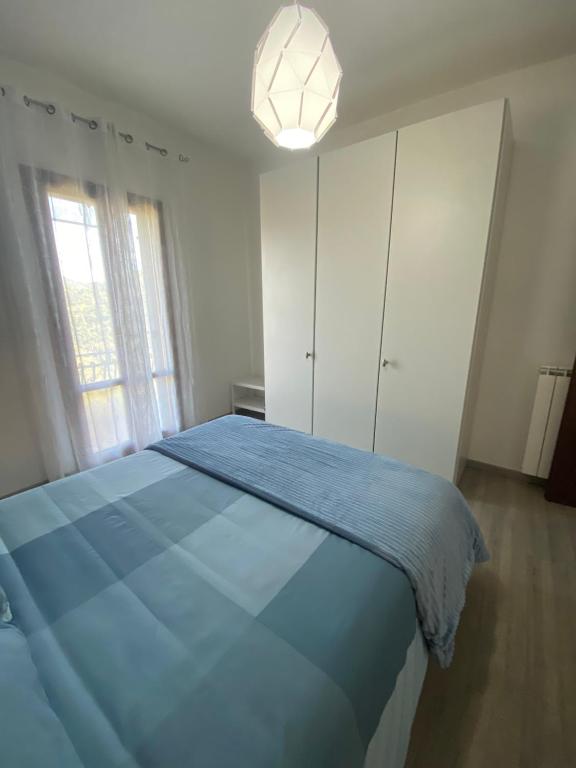 Łóżko lub łóżka w pokoju w obiekcie Casato Clavelli 1