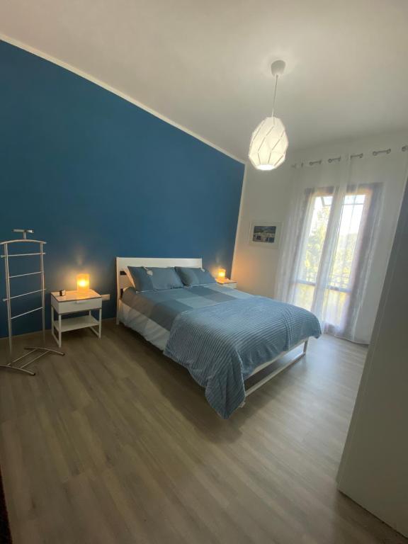 Łóżko lub łóżka w pokoju w obiekcie Casato Clavelli 1