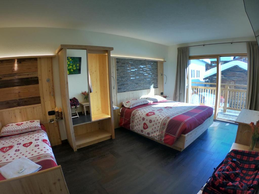 Postel nebo postele na pokoji v ubytování Hotel Carpe Diem