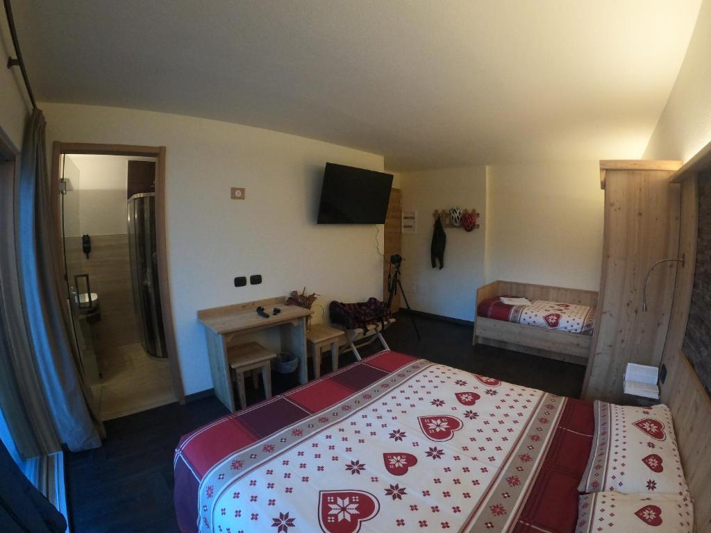 Postel nebo postele na pokoji v ubytování Hotel Carpe Diem