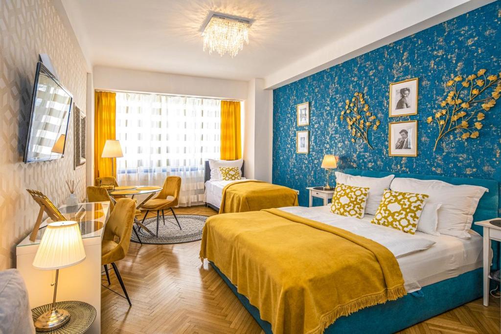 VIP Apartments Budapest Central tesisinde bir odada yatak veya yataklar