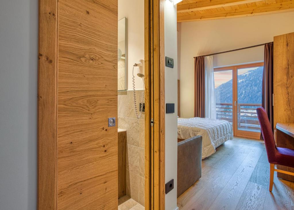 Postel nebo postele na pokoji v ubytování Edelweiss Alpine Nature