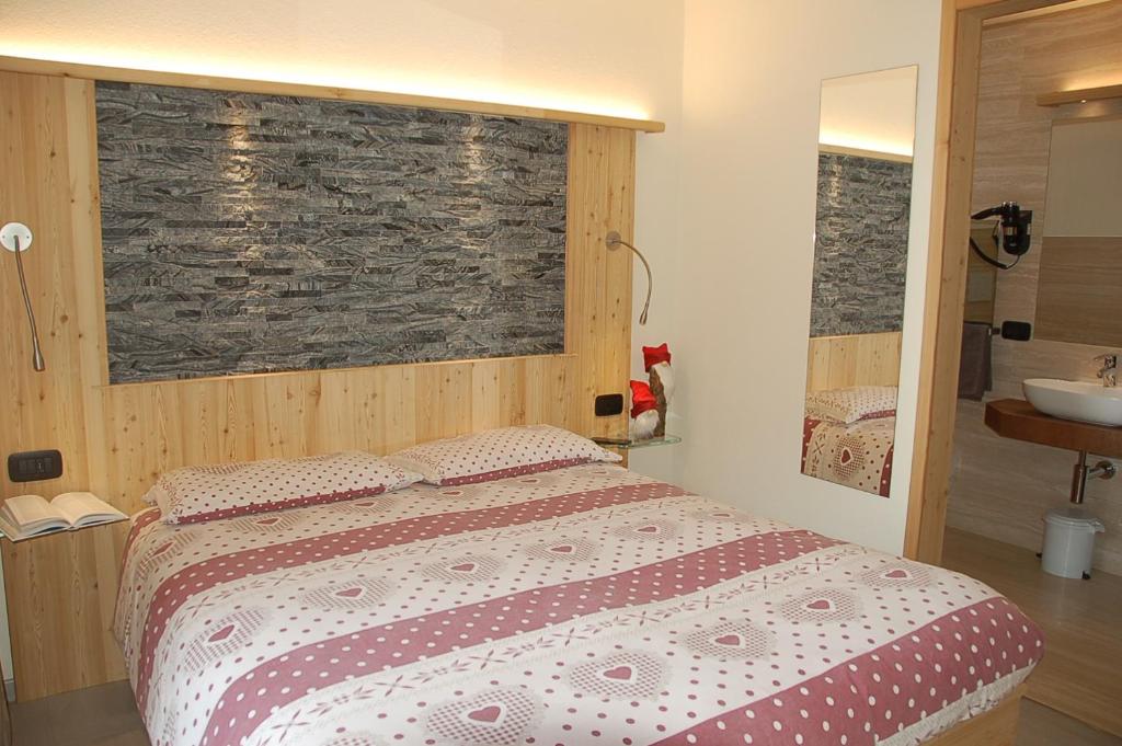 Postel nebo postele na pokoji v ubytování Hotel Carpe Diem