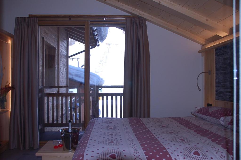 Postel nebo postele na pokoji v ubytování Hotel Carpe Diem
