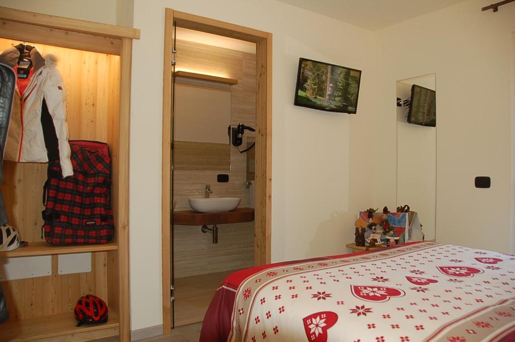 Postel nebo postele na pokoji v ubytování Hotel Carpe Diem