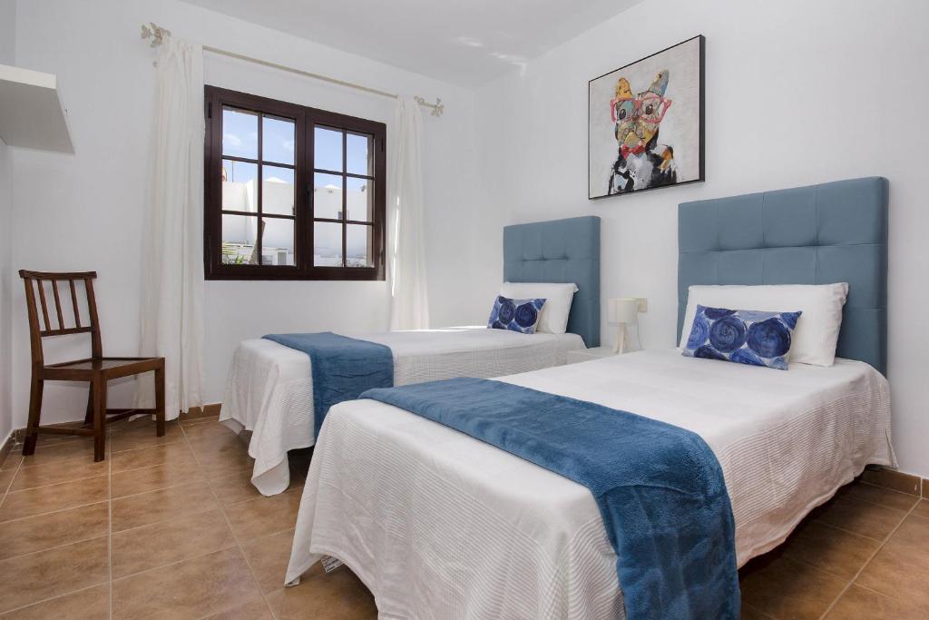 Postel nebo postele na pokoji v ubytování Casa Pamipa