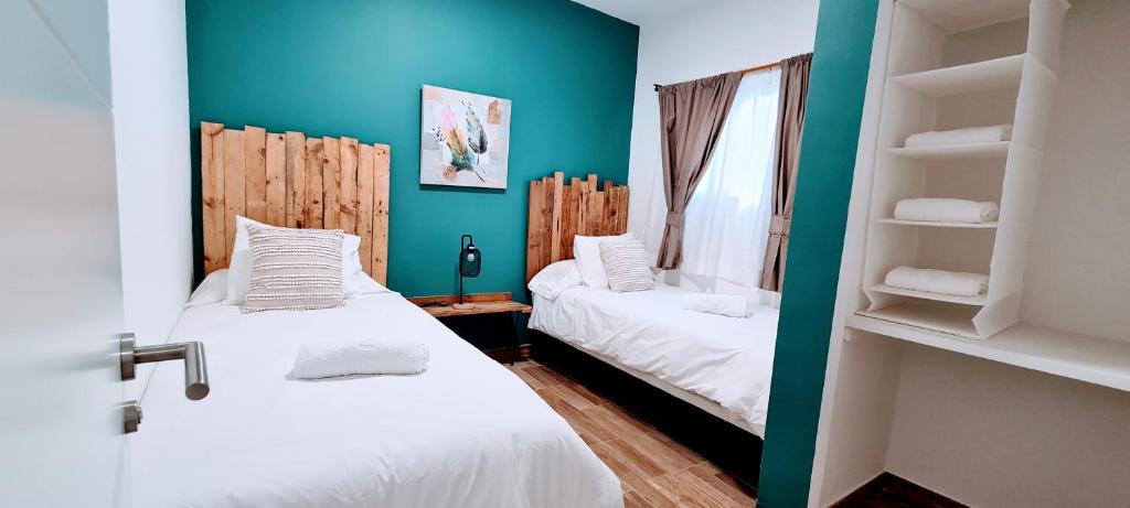 Postel nebo postele na pokoji v ubytování VV Casa Vivaldi Las Palmas "by henrypole home"