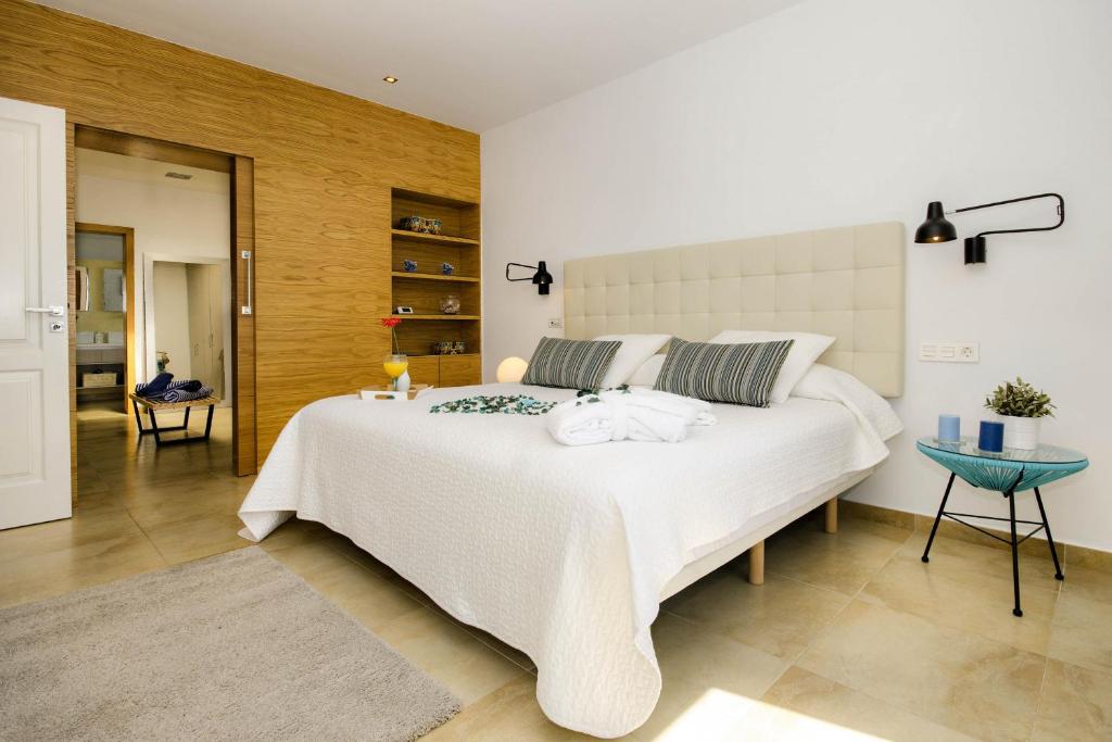 Postel nebo postele na pokoji v ubytování Casa Botavara