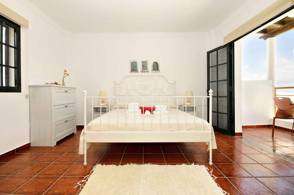 Postel nebo postele na pokoji v ubytování Villa Adelina