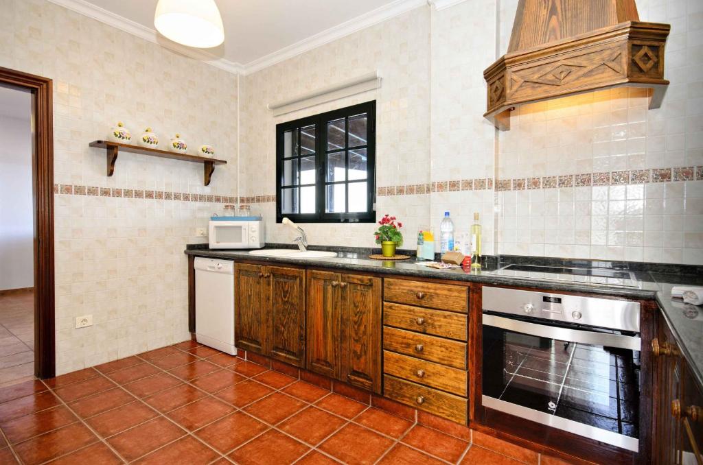 Kuchyň nebo kuchyňský kout v ubytování Villa Adelina