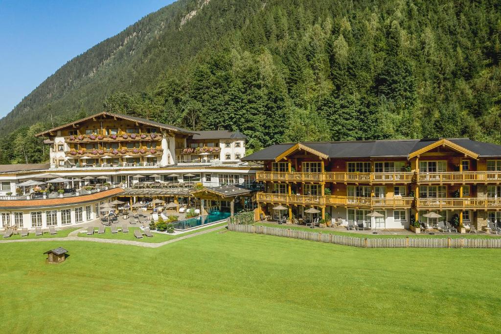 an aerial view of a resort with a mountain at Living & Spa Vitalhotel Edelweiss in Neustift im Stubaital