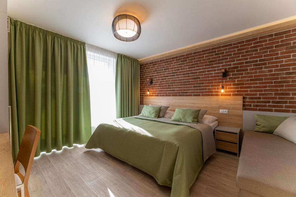 Postel nebo postele na pokoji v ubytování Hotel Aqualand Inn