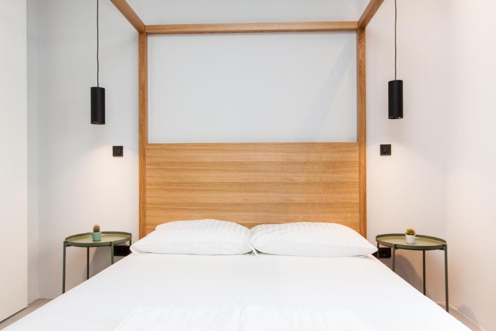 Postel nebo postele na pokoji v ubytování Rooms and Apartments Glossy