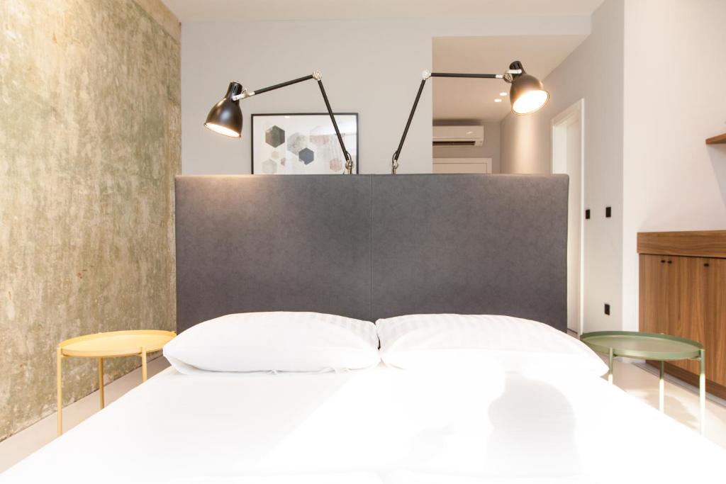 Postel nebo postele na pokoji v ubytování Rooms and Apartments Glossy