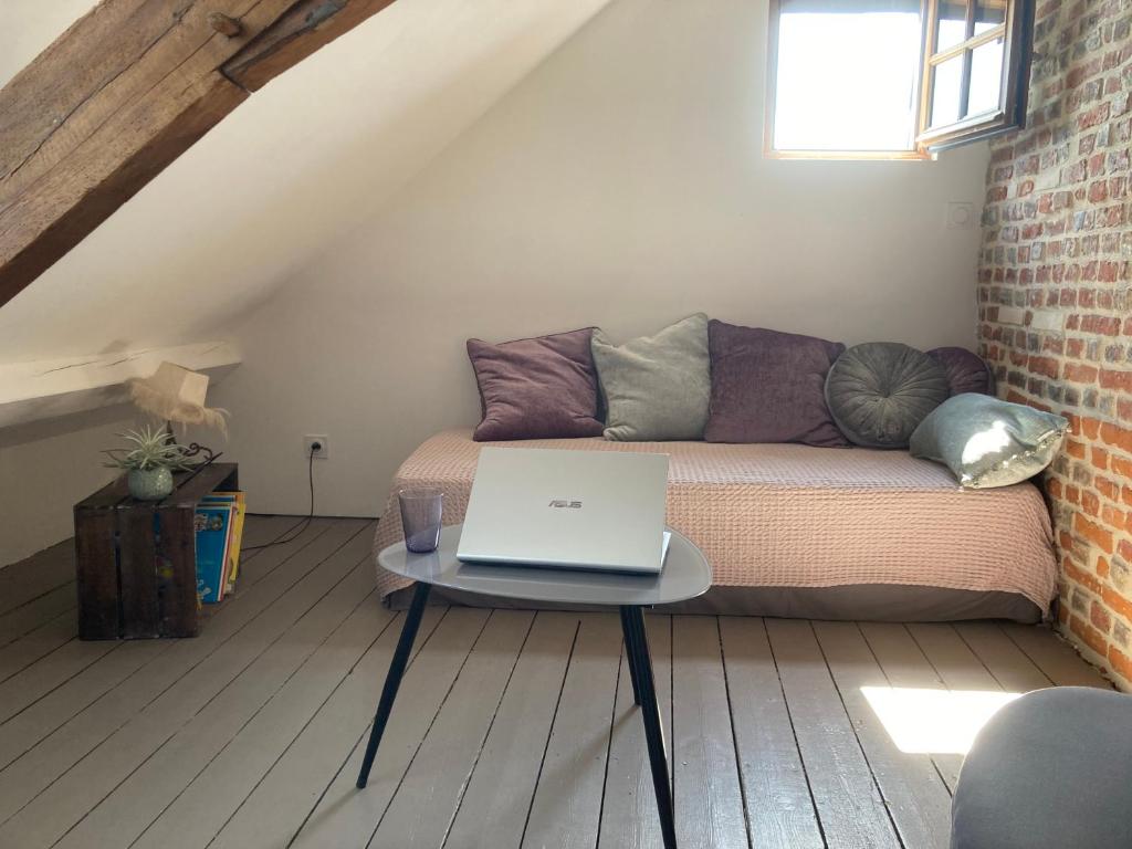 Posezení v ubytování Chambres chez l'habitant Capucine