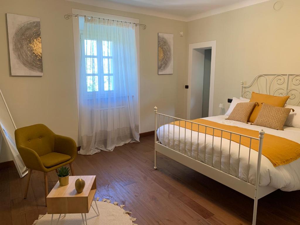 A bed or beds in a room at Borgo La Morra