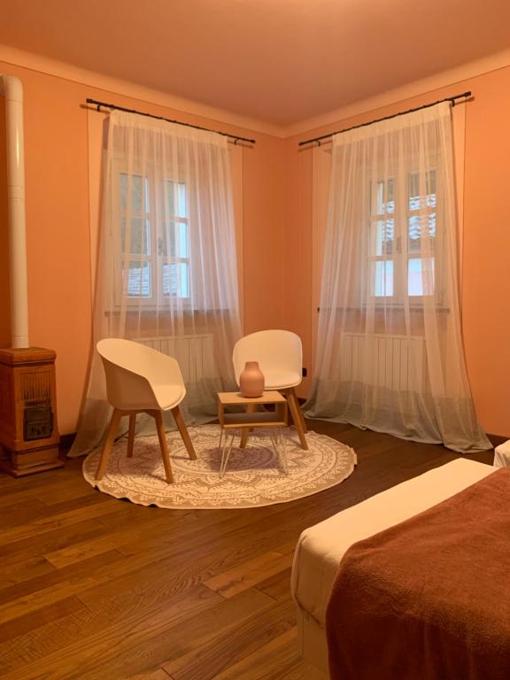 A bed or beds in a room at Borgo La Morra