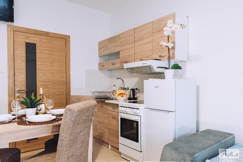 Kuchyň nebo kuchyňský kout v ubytování Relax Apartment - Ada