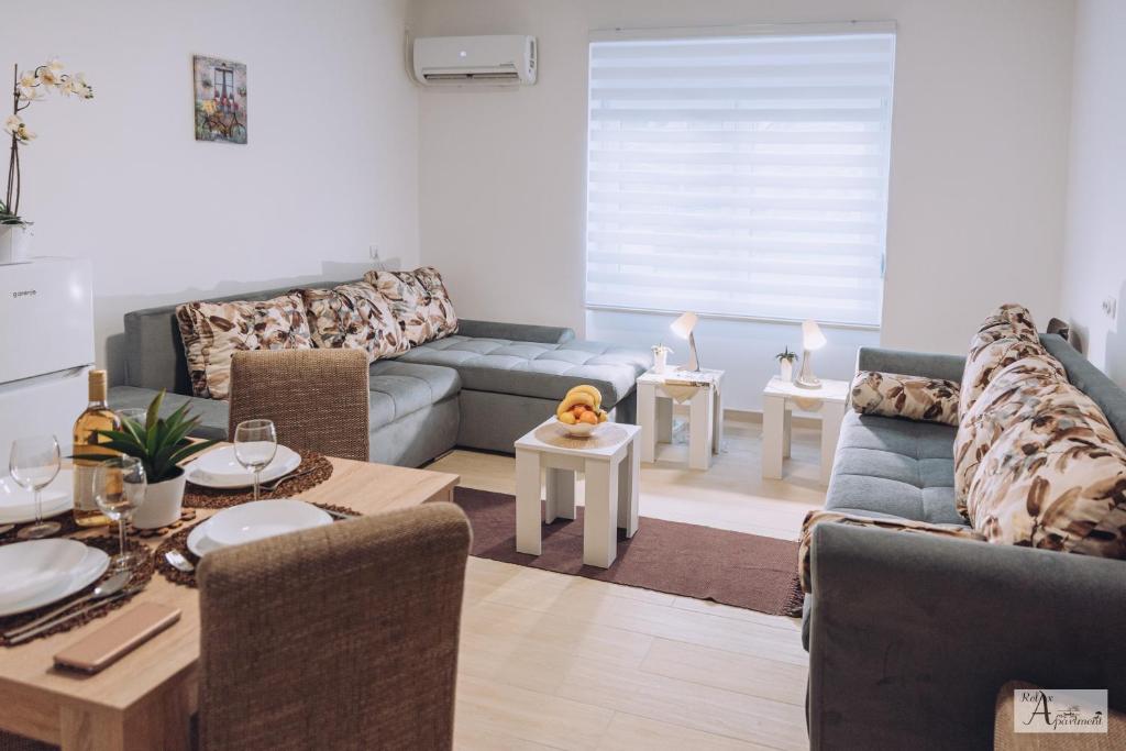 Posezení v ubytování Relax Apartment - Ada