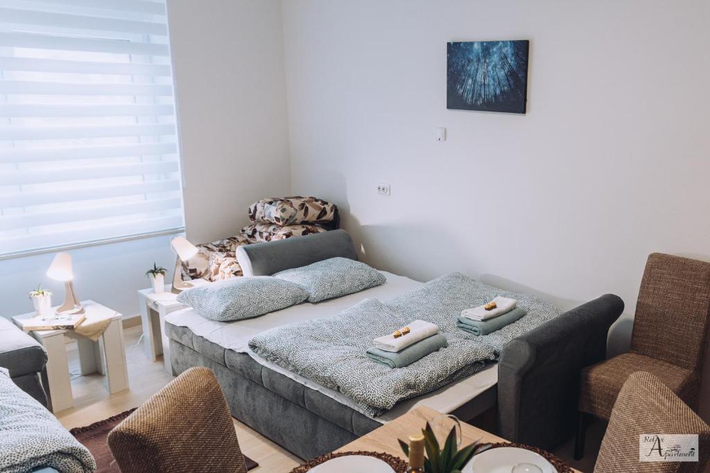 Postel nebo postele na pokoji v ubytování Relax Apartment - Ada