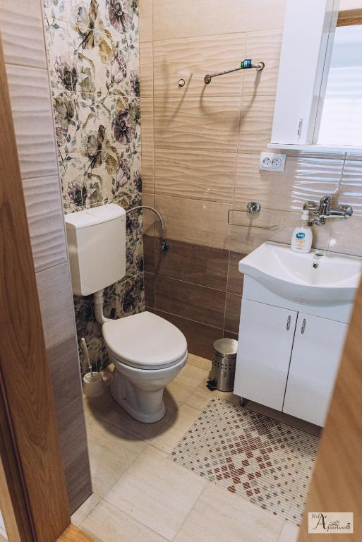Koupelna v ubytování Relax Apartment - Ada