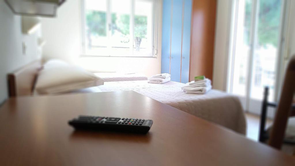 Postel nebo postele na pokoji v ubytování Hotel President