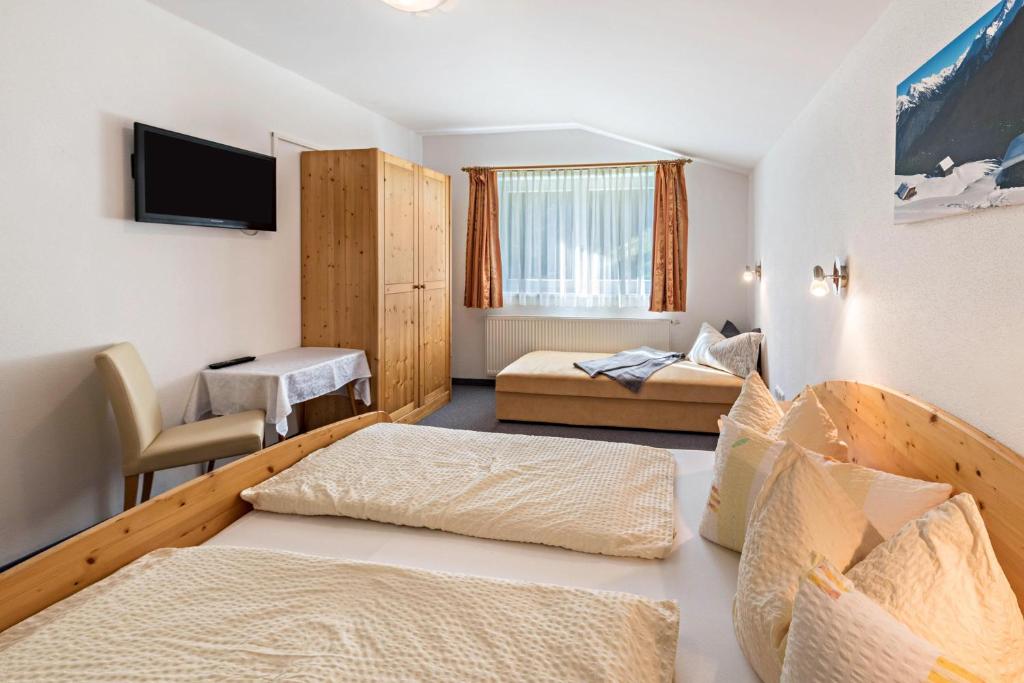 Posteľ alebo postele v izbe v ubytovaní Ferienwohnung Helena